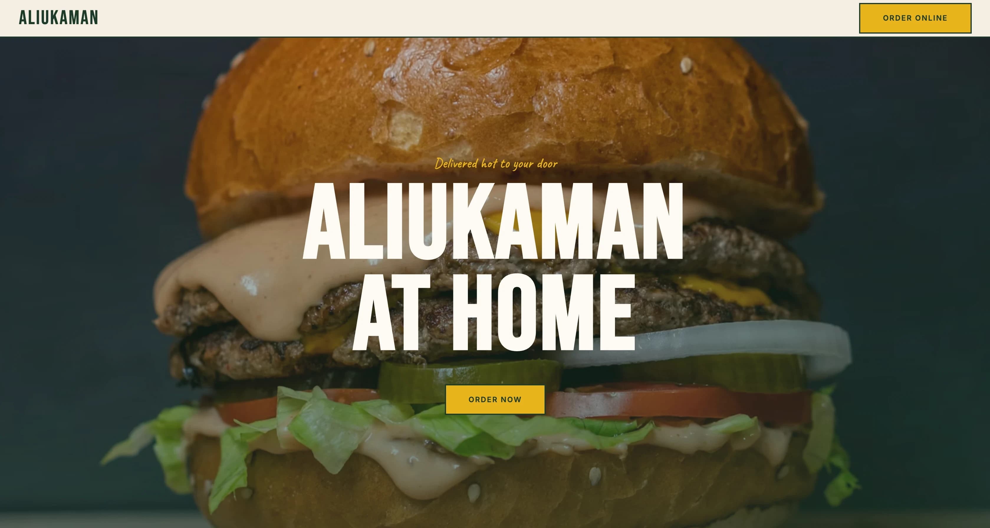 The Aliukaman homepage: a full-bleed close-up of a loaded burger, with the headline "Aliukaman at home" and a mustard-yellow Order now button.